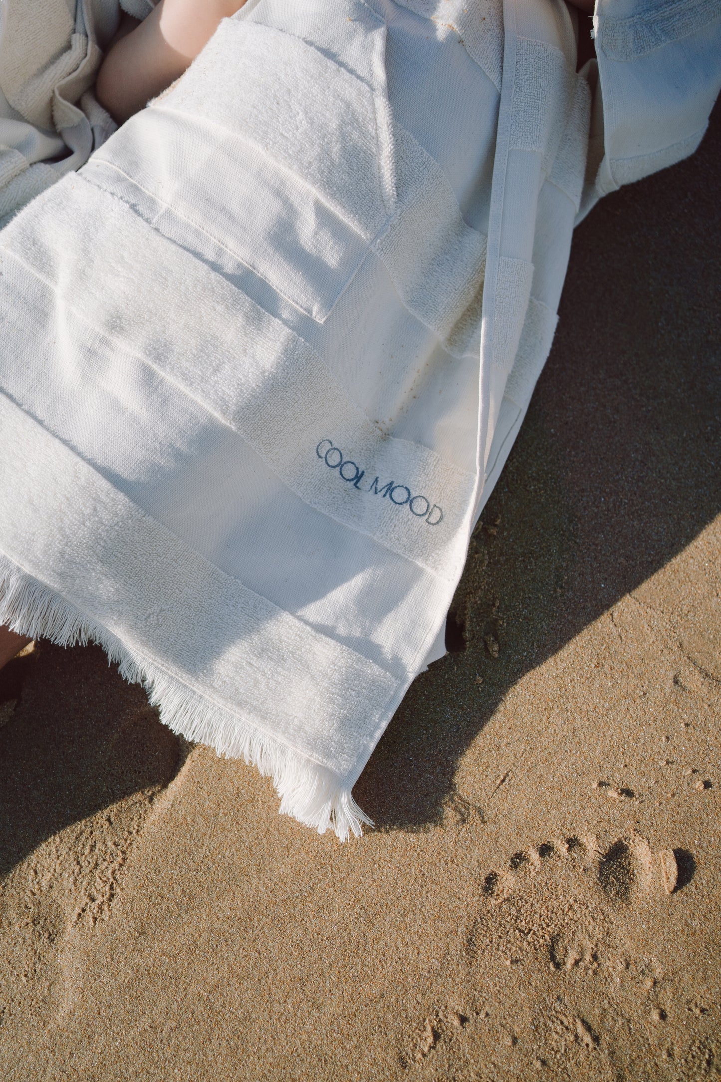 Soft terry stripes, eyelash fringing detail and brand logo embroidery