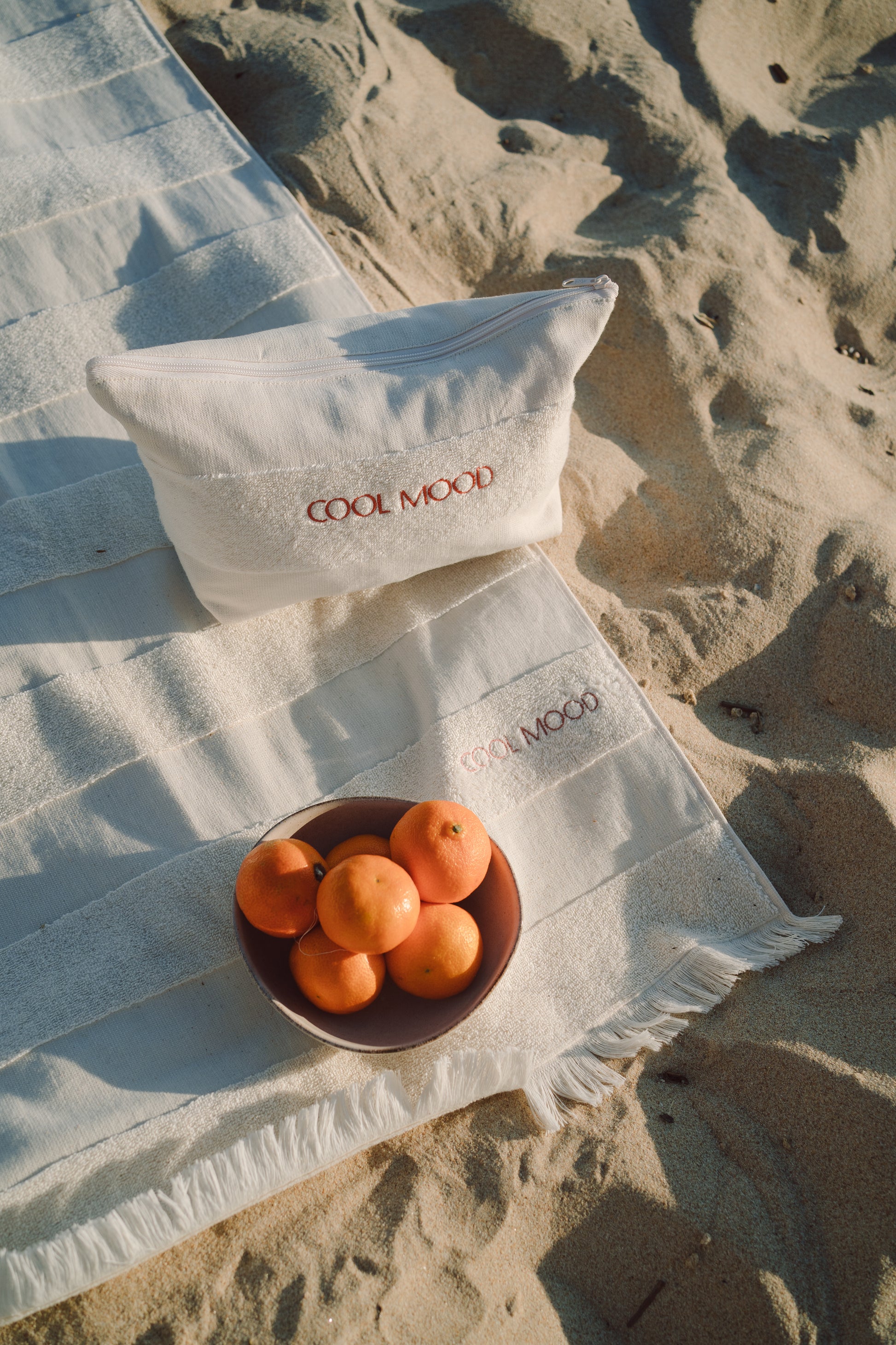You can also find the perfect pouch to match with your beach towel!