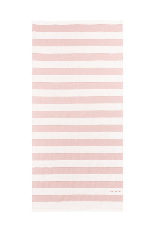Beach towel in rust shade, with soft terry stripes