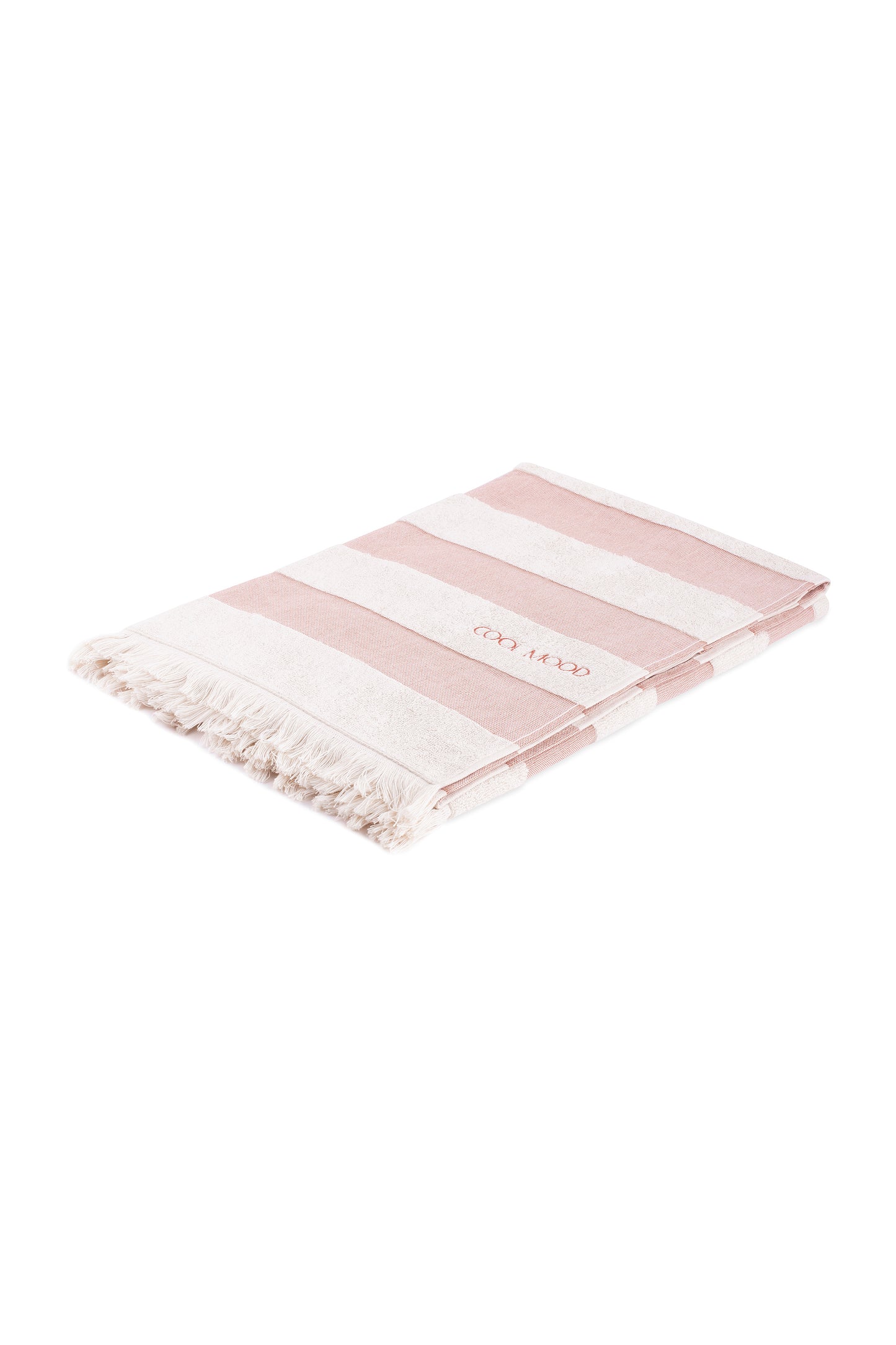 Beach towel in rust shade, with soft terry stripes, eyelash fringing detail and embroidery in rust