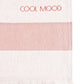 Beach towel in rust shade, with soft terry stripes, eyelash fringing detail and embroidery in rust.