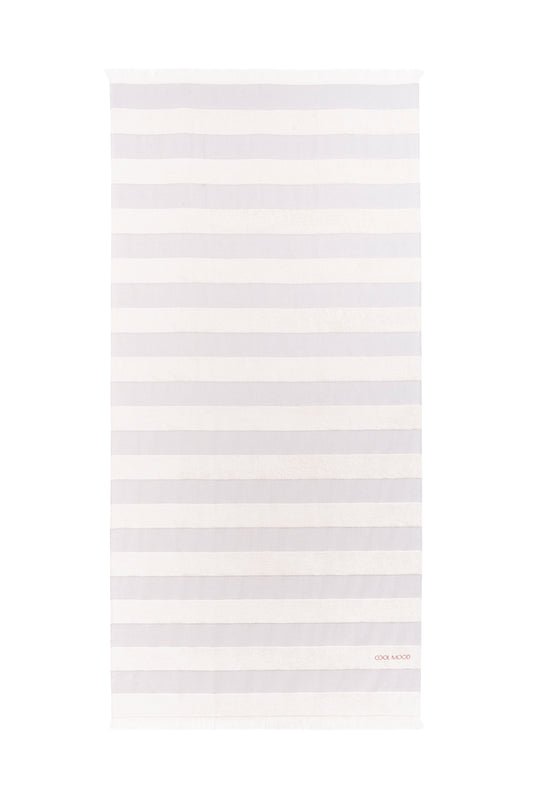 Beach towel in grey shade, with soft terry stripes